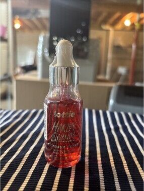 Lottie London x Harley Quinn Crimson Craze Primer Hydrating crimson serum-primer
